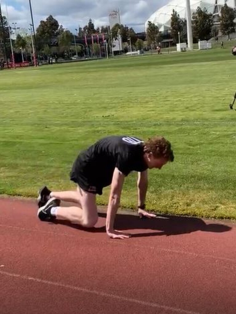 Lewis Hayes collapsed to the ground in the final moments of the 2km time trial