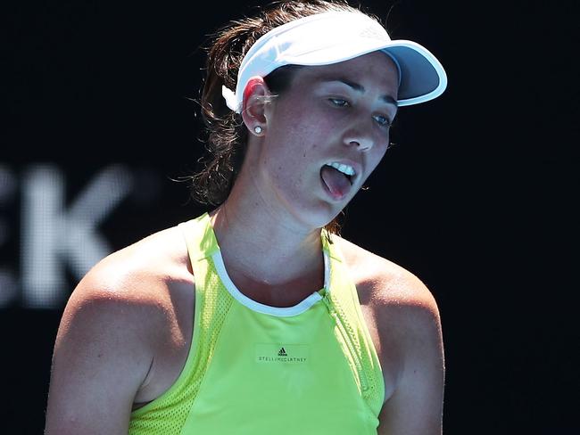 MELBOURNE, AUSTRALIA - JANUARY 18:  Garbine Muguruza of Spain reacts in her second round match against Su-Wei Shieh of Taiwan on day four of the 2018 Australian Open at Melbourne Park on January 18, 2018 in Melbourne, Australia.  (Photo by Clive Brunskill/Getty Images)