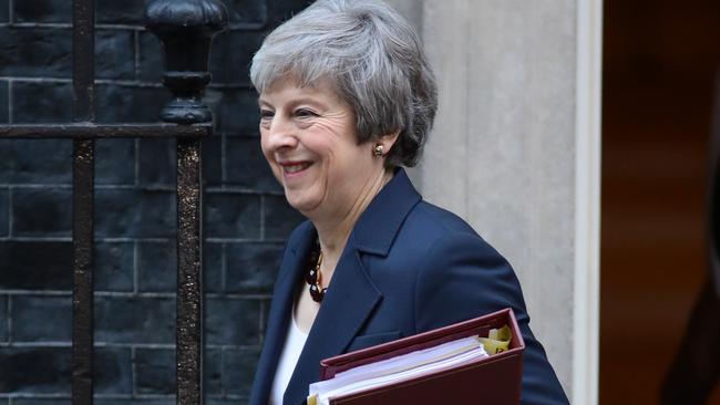 ***BESTPIX*** LONDON, ENGLAND - NOVEMBER 14: Prime Minister Theresa May leaves 10 Downing Street for Prime Minister's questions on November 14, 2018 in London, England. Theresa May will today attempt to secure the backing of her government ministers for the Brexit deal at a special cabinet meeting in Downing Street this afternoon. Brexiteers are already decrying the deal as a betrayal and urging ministers to reject the deal. (Photo by Dan Kitwood/Getty Images)