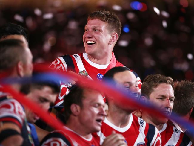 Dylan Napa enjoys a winning feeling with former Roosters teammates after the 2018 NRL Grand Final. Picture: Matt King/Getty Images