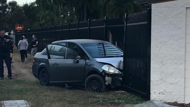 The car which ploughed into the fence of a Townsville church.