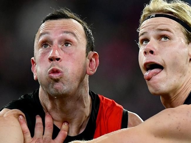 MELBOURNE, AUSTRALIA - JUNE 09: Todd Goldstein of the Bombers and Tom De Koning of the Blues compete in the ruck during the round 13 AFL match between Essendon Bombers and Carlton Blues at Melbourne Cricket Ground, on June 09, 2024, in Melbourne, Australia. (Photo by Josh Chadwick/Getty Images)