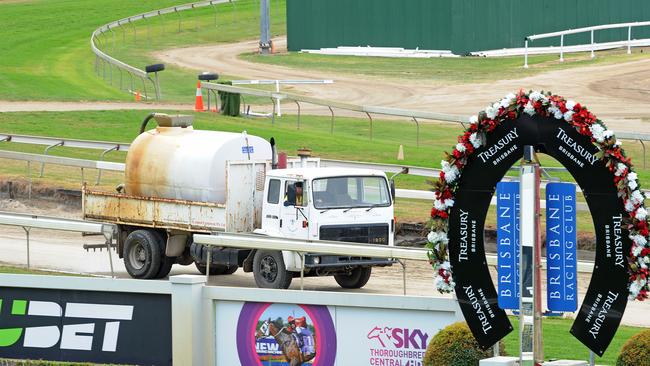 Work at Eagle Farm Racecourse in May 27 this year. PICTURE: AAP image, John Gass