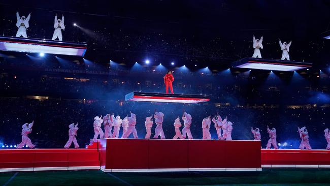 The giant stage probably didn’t help the turf. (Photo by TIMOTHY A. CLARY / AFP)