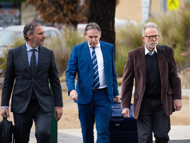 William Swale (right) attends Ballarat Magistrates Court with his lawyers. Picture: Nicki Connolly