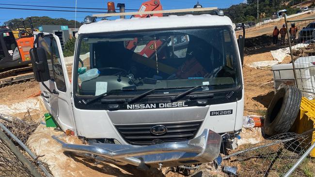 The driver of an out-of-control truck carrying tonnes of sand and cement managed to steer the vehicle away from traffic on Mona Vale before he leapt from the cabin and broke his leg. Picture: Supplied