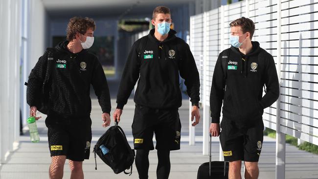 Richmond players arrive at Coolangatta Airport to join their teammates in the AFL bubble. Picture: Adam Head