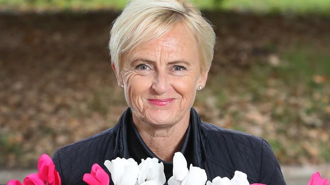 Mothers Day feature  on women who have lost their mums. Katie Allen former  politician has  written a letter to her late mum as part of the feature and is pictured with cyclamen plants that are part of the Motherless Daughters event. Friday, April 21, 2023. Picture: David Crosling