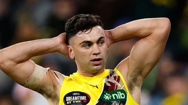 MELBOURNE, AUSTRALIA - MAY 20: Tim Taranto of the Tigers reacts to a missed shot at goal during the 2023 AFL Round 10 match between the Essendon Bombers and the Richmond Tigers at the Melbourne Cricket Ground on May 20, 2023 in Melbourne, Australia. (Photo by Dylan Burns/AFL Photos via Getty Images)