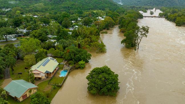 The Barron River in flood after Cyclone Jasper on the northern side of Cairns. Picture: Cockatours