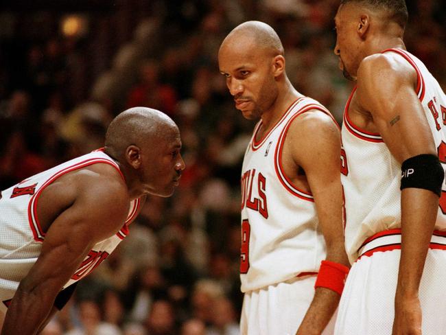 7 Jun 1996:  Michael Jordan of the  Chicago Bull, left, discusses strategy with teammates Ron Harper, center, and Scottie Pippen during a time-out on the court during the fourth quarter of game two in the NBA Finals at the United Center in Chicago, Illino