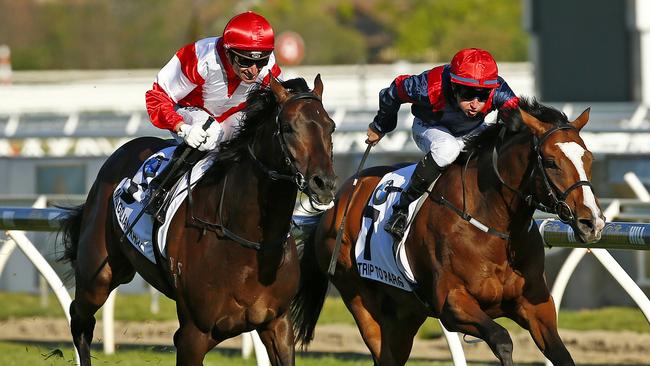 Caulfield Cup Day races at Caulfield Racecourse, Race9- (L) Opie Bosson onboard Mongolian Khan wins from (R) Tommy Berry onboard Trip to Paris. with the cup . Melbourne. 17th October 2015. Picture: Colleen Petch. CaulfieldCup15