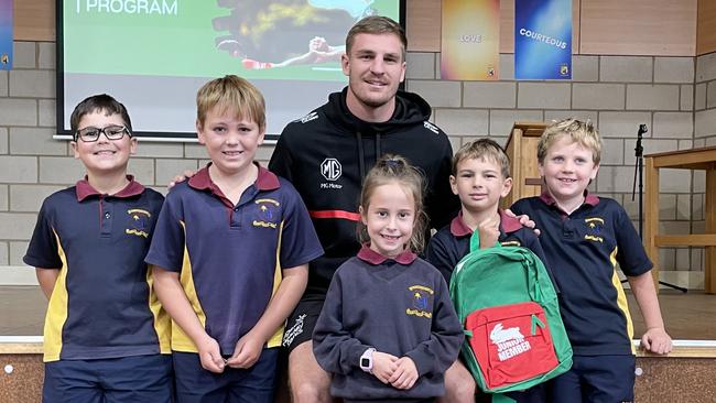 St Mary's Primary School students, Peter Warman, Hugh Buckley, Ruby Lawson, Hunter Dixon and Sebastian (Bashie) Sykes, with Jed Cartwright from the South Sydney Rabbitohs. Picture: Aymon Bertah.