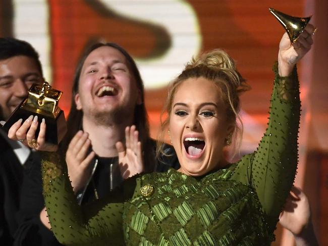 Recording artist Adele snapped her Grammy. Picture: Kevork Djansezian/Getty Images/AFP