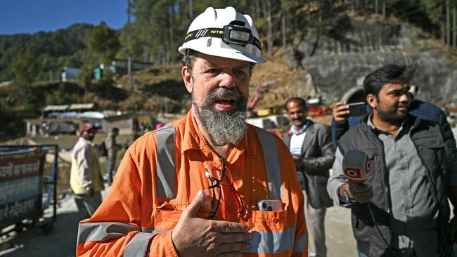 Arnold Dix pictured shortly after camera footage had shown the workers alive for the first time, looking exhausted and anxious, as rescuers attempted to create new passageways to free them. Pictuer: Arun Sankar/ AFP