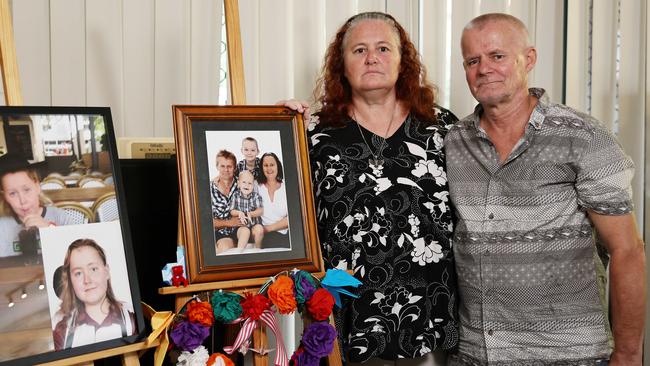 Eloise and Frank Lambourn stand in front of a shrine to 15-year-old son at their Edmonton home. Picture: Brendan Radke