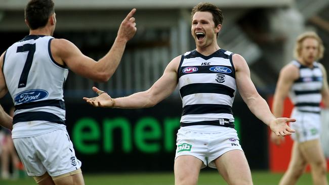 Patrick Dangerfield celebrates a goal with Harry Taylor. Picture: Colleen Petch