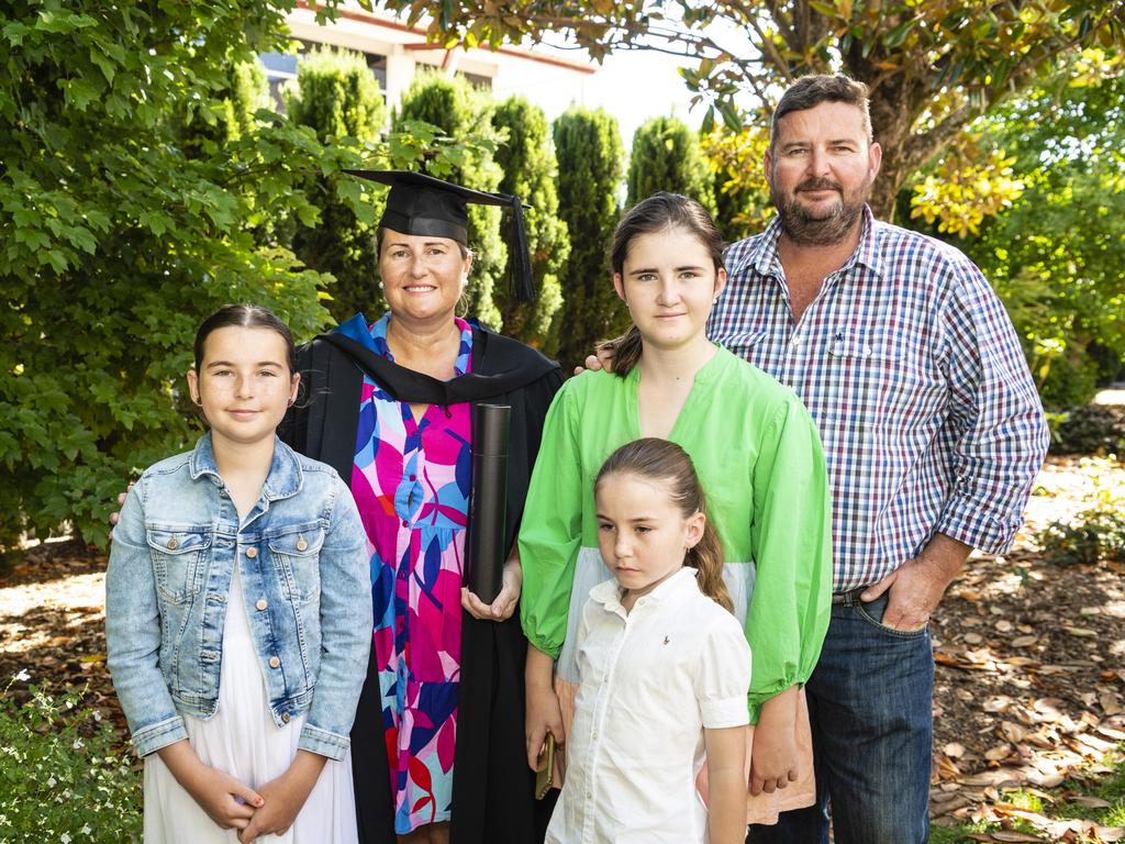 Bachelor of Nursing graduate Rebecca Hertslet with family (from left) Annabelle, Camilla, Matilda and Tristram Hertslet at the UniSQ graduation ceremony at Empire Theatres, Wednesday, December 14, 2022.