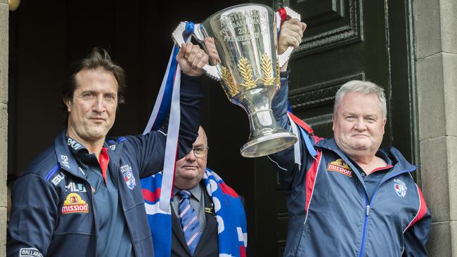 Luke Beveridge and Peter Gordon celebrate the 2016 premiership. Picture: Jason Edwards