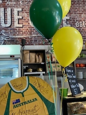 Belle Vue Cafe has set up the vibrant green and gold display in support of homegrown Warwick athlete Harriet Hudson, who will compete for an Olympic gold medal on Wednesday. Picture: social media