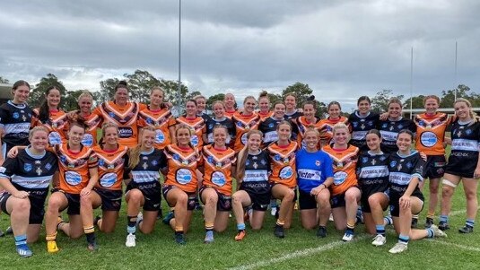 The Entrance Tigers and Terrigal-Wamberal Sharks women’s tackle sides after a recent trial game. Photo: supplied.