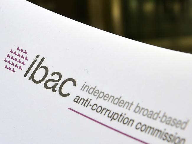 Independent Broad-Based Anti-Corruption Commission (IBAC) corporate paperwork is seen outside the County Court of Victoria in Melbourne Tuesday, April 28, 2015.  (AAP Image/Julian Smith) NO ARCHIVING