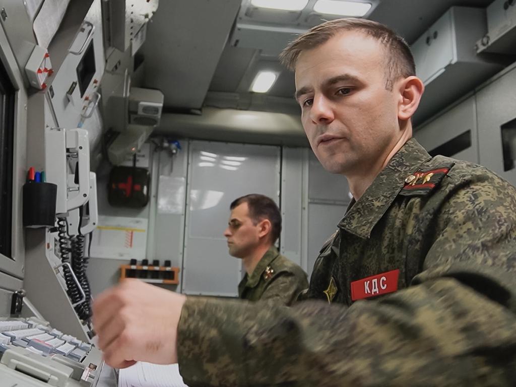 Russian military personnel control the launch of an intercontinental ballistic missile as part of drills of Russia's nuclear force. Picture: Russian Defense Ministry Press Service via AP