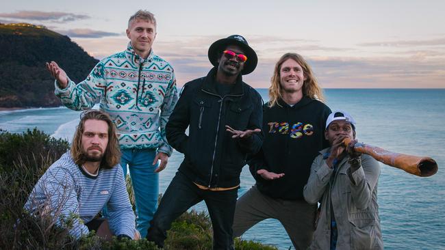 Northern Territory rock band King Stingray, pictured at Stanwell Park, NSW in June 2022 ahead of its debut album release. L-R: Lewis Stiles (front), Campbell Messer (back), Yirrnga Yunupingu, Roy Kellaway and Dimathaya Burarrwanga. Picture: Sam Brumby