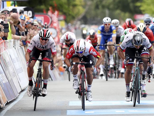 CYCLING - Tour Down Under - Stage 5 - Glenelg to Strathalbyn. Sprint finish - eventual winner after protesst - Jasper Philipsen (far left) with Caleb Ewan (centre) . Picture SARAH REED