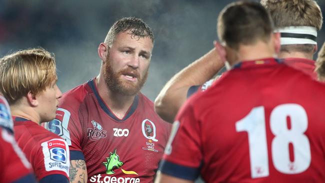 Scott Higginbotham of the Reds (central) speaks to the team in the Super Rugby match between the Reds and the Blues at Eden Park in Auckland, New Zealand, Friday, June 29, 2018. (AAP Image/SNPA, Fiona Goodall) NO ARCHIVING, EDITORIAL USE ONLY