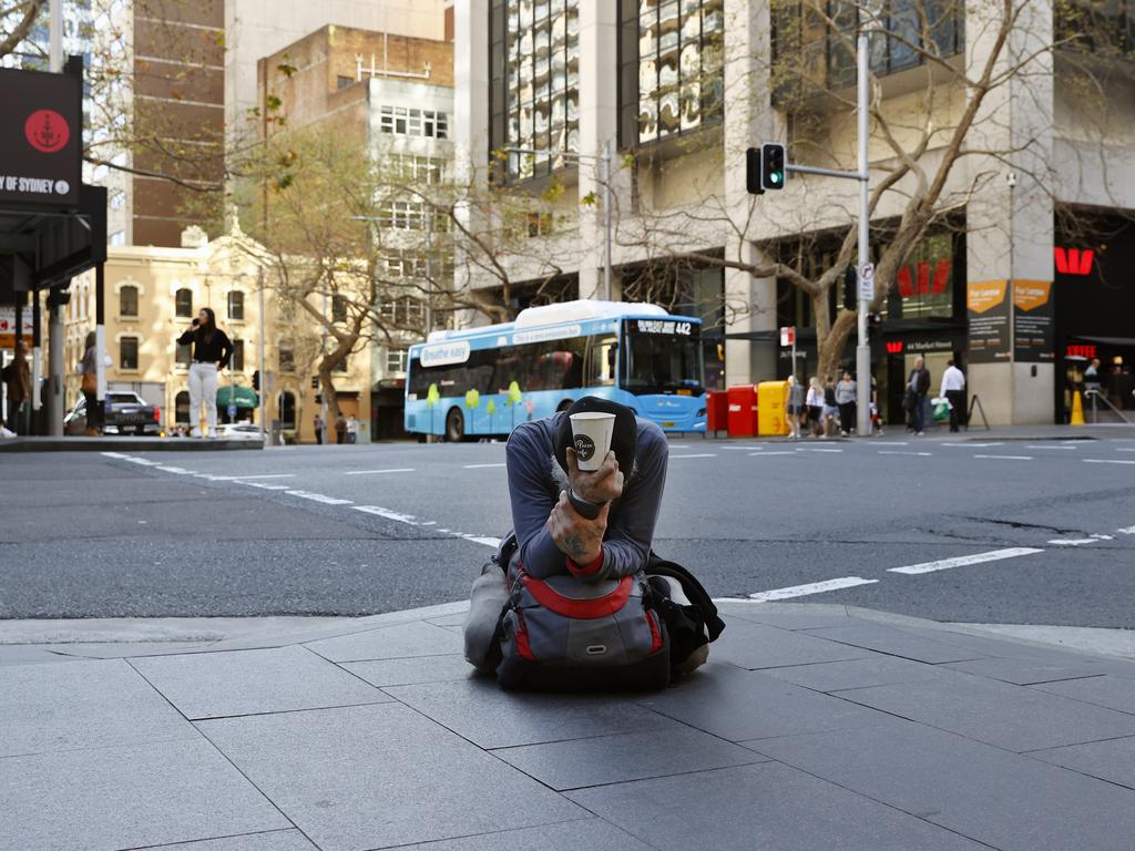 A homeless person begging on the corner of Market St and York St. Picture: Richard Dobson