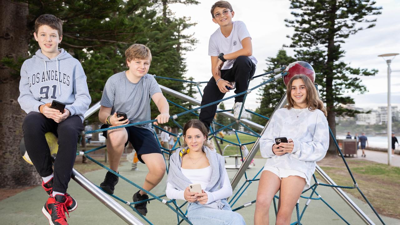 Year 7 students Zac Nowytarger Jamie Fielding, Georgie Pogson, Zach Smith and Maddy Ryan are among the tweens and teens abandoning emojis in favour of abbreviated text. Picture: Renee Nowytarger