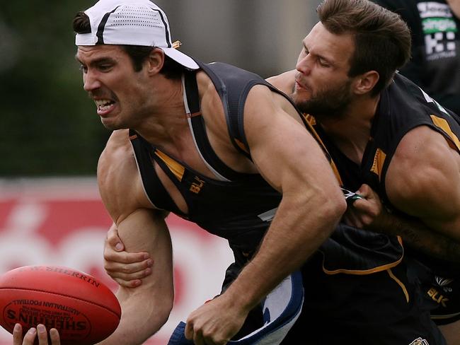 Ben Lennon tackles Alex Rance at training, which the Tigers will need to do a lot more of next season. Picture: Wayne Ludbey