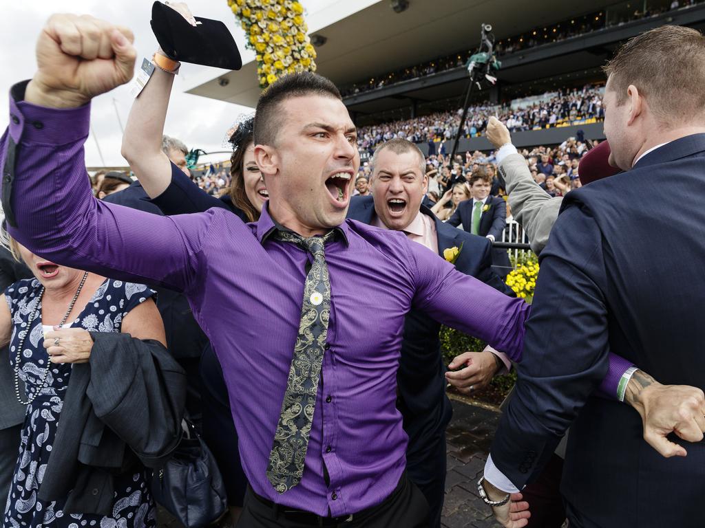 Connections of the winning Golden Slipper horse She Will Reign celebrate at Rosehill Gardens.