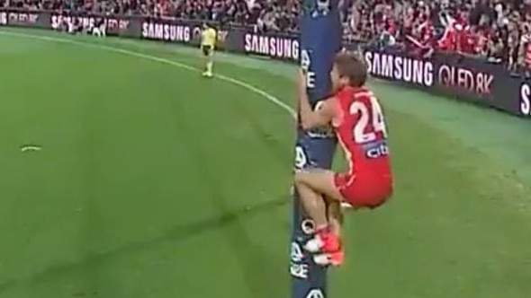 Dane Rampe shakes the goalpost.