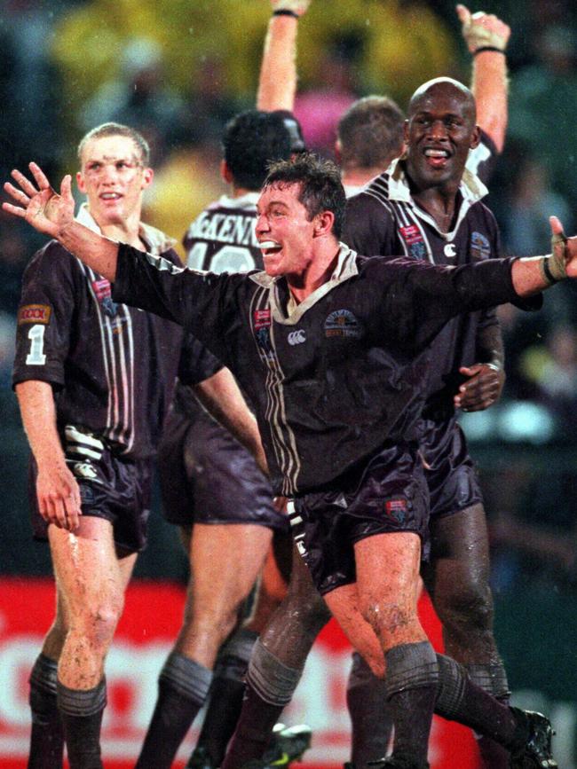 JUNE 22, 1999 : Paul Green (open arms) Wendell Sailor (R) 22/06/99 after historic draw in third match of State of Origin NRL series NSW v Queensland at Suncorp Metway Stadium. Pic Patrick Hamilton. Rugby League