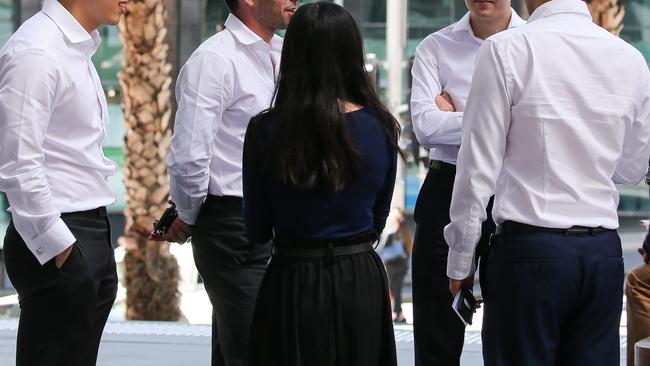 SYDNEY, AUSTRALIA - NewsWire Photos, NOVEMBER 16 2021:  Sydney siders wearing suits are seen getting coffee during lunch hour in the CBD, in Sydney. Picture: NCA Newswire / Gaye Gerard