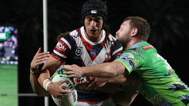 GOSFORD, AUSTRALIA - MAY 29: Joseph Suaalii of the Raiders is tackled at the try line during the round 12 NRL match between the Sydney Roosters and the Canberra Raiders at Central Coast Stadium, on May 29, 2021, in Gosford, Australia. (Photo by Ashley Feder/Getty Images)