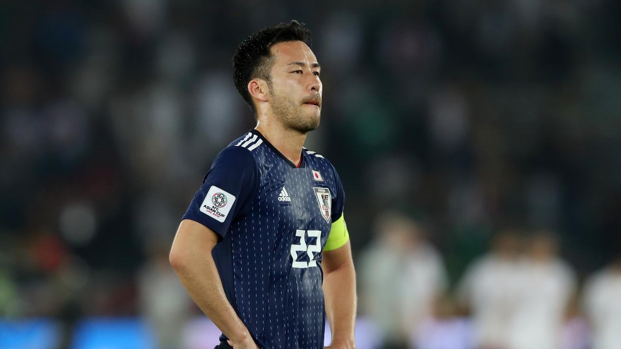 Maya Yoshida of Japan looks dejected. (Photo by Francois Nel/Getty Images)