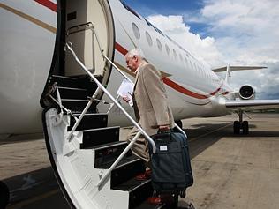 The Australian's Asia Pacific Editor Rowan Callick waits in the departure lounge at Port Moresby airport, before boarding an...
