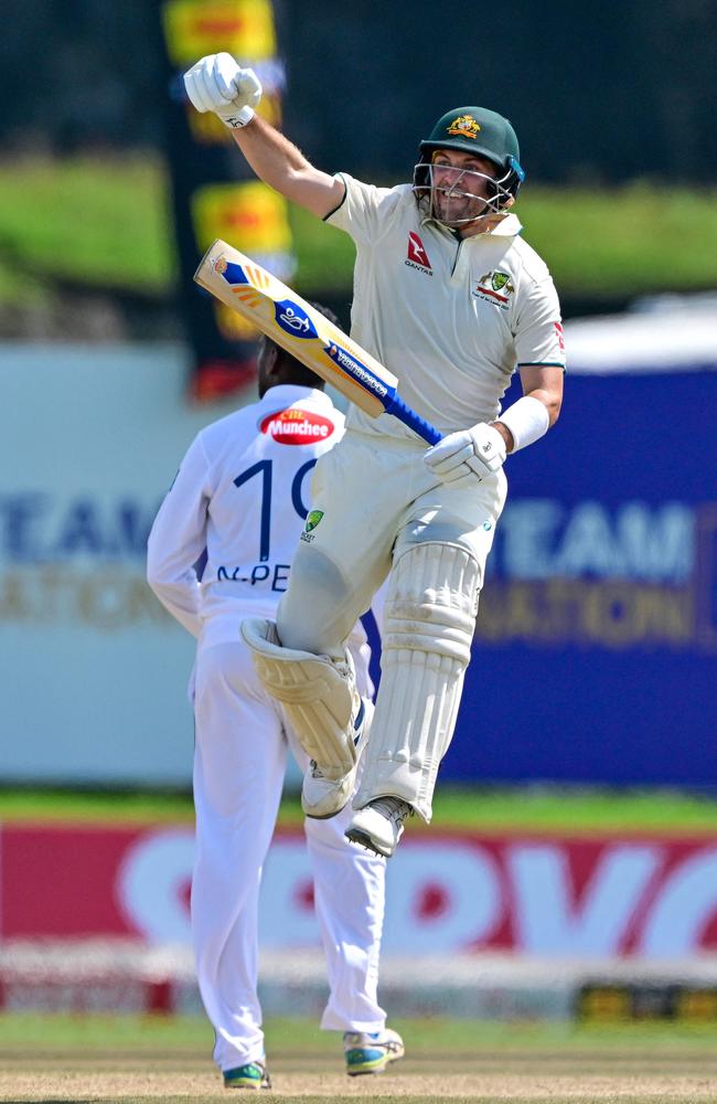 Australia's Josh Inglis celebrates after scoring a century on debut. Picture: AFP