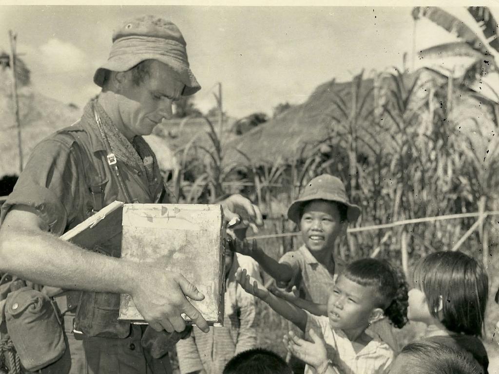 Harry Dennis is pictured on a goodwill tour to Ong Huhn Village during the Vietnam War in 1965/66. Picture: Supplied