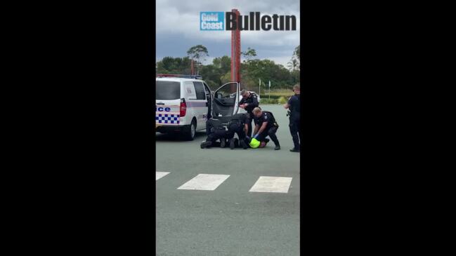 Violent arrest in shopping centre carpark