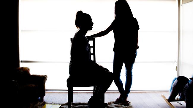 The girl and her mother, who cannot be identified. Picture: Matt Turner