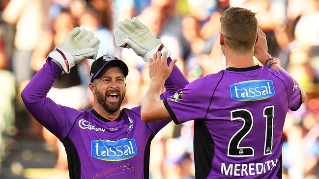 ADELAIDE, VICTORIA — JANUARY 21: (L-R) Matthew Wade of the Hobart Hurricanes celebrates with Riley Meredith of the Hobart Hurricanes during the Big Bash League match between the Adelaide Strikers and the Hobart Hurricanes at Adelaide Oval on January 21, 2019 in Adelaide, Australia. (Photo by Daniel Kalisz/Getty Images)