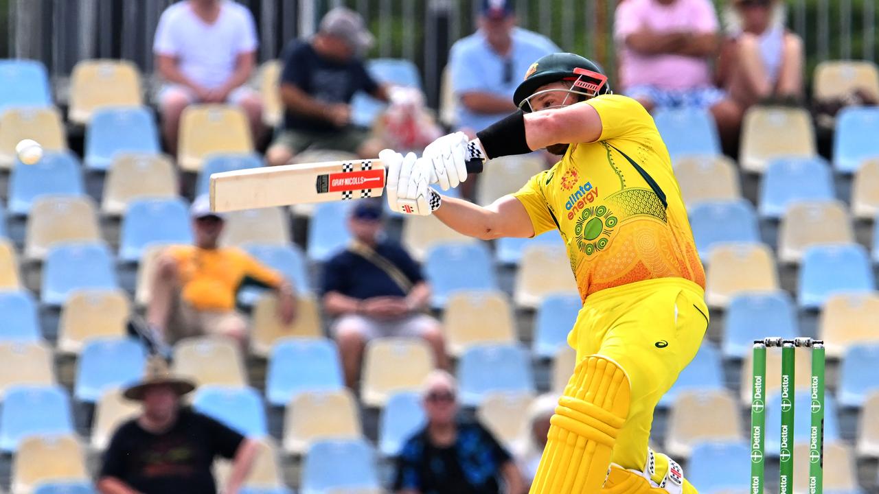 Australia's Aaron Finch plays a shot in air. Photo by Saeed Khan / AFP