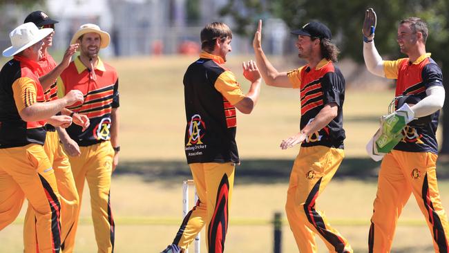 Geelong Cricket Association celebrate the wicket of Warrnambool batsman Chris Bant off the bowling of Josh Lacey. Picture: Mark Wilson