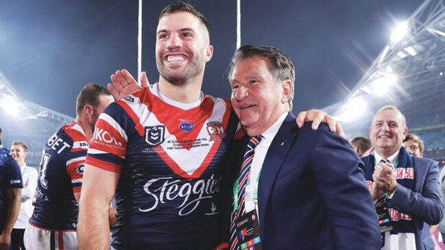 James Tedesco with Roosters chairman Nick Politis after the 2019 grand final.