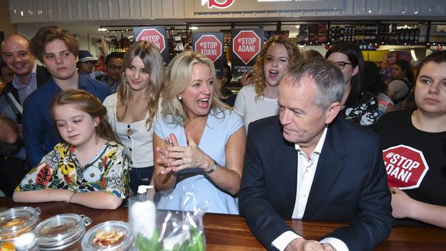 Bill Shorten with wife Chloe, son Rupert, left, and daughters Clementine and Georgette in the Adelaide Central Market on Saturday with Adani mine protesters. Picture: LUKAS COSH/AAP