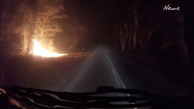 Incredible footage of a fire truck's close call on the NSW south coast